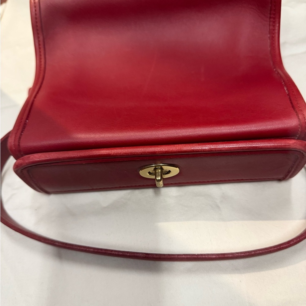 Coach bag, top snap and closure handbag